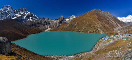 Gokyo lake surrounded by snow mountains of Himalayas in Nepal
