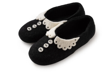 Felt slippers on white background in closeup