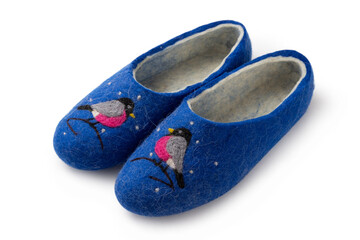 Felt slippers on white background in closeup