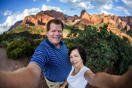 Middle Aged Couple Taking A Vacation Selfie