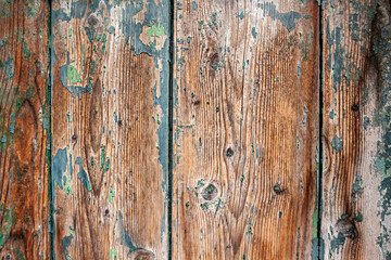 Brown old wooden door texture close up. Vintage wood pattern