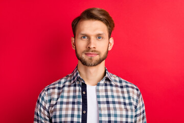Photo of young handsome man happy positive smile confident wear plaid shirt isolated over red color background