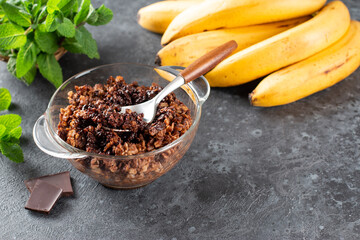 Chocolate oatmeal porridge with chocolate. The concept of a breakfast. Copy space.