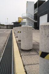 Obraz premium Street with concrete bollards