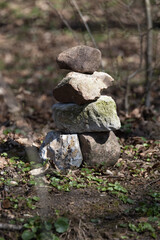 Mystical stone cairns in the forest