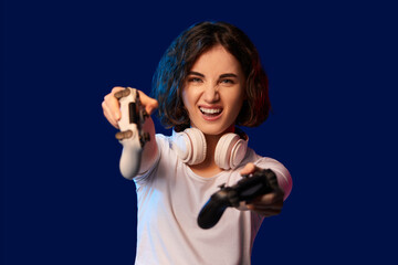 happy curly involved gamer girl playing video games © producer