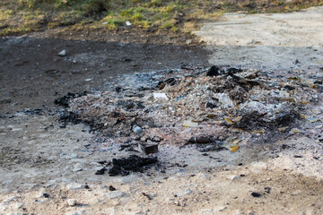 close-up photo of the ash after burning the plastic