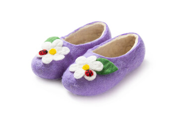 Felt slippers on white background in closeup