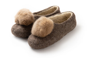 Felt slippers on white background in closeup