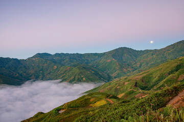 Ta Xua is a famous mountain range in northern Vietnam. All year round, the mountain rises above the clouds creating cloud inversions.