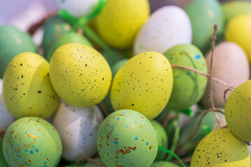 Close up view of colorful decorative eggs. Easter accessories decoration concept. 
