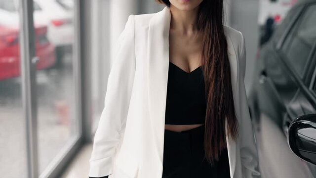 close-up of a white jacket on a sexy girl