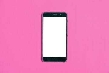 Phone on a pink background, copy space. Mock up on the smartphone screen.