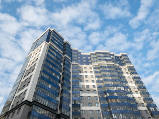 Fototapeta na wymiar High-rises apartment buildings against the sky