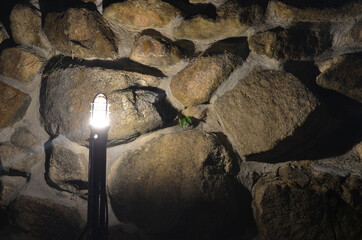 light lamp with stone wall in the mountain. 