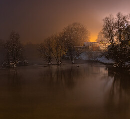 Night by the foggy river