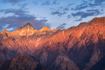 Mesmerizing view of Himalaya during sunset from Kuari pass hiking trail near Auli, Uttarakhand, India.