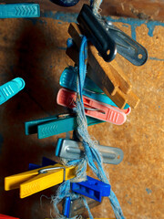 colorful clothespins attached to the rope
