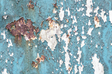 Old turquoise grunge background with rust and paint peeling off