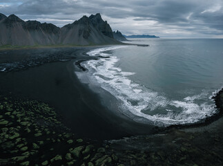 Fototapeta na wymiar Aerial drone view of Vestrahorn mountain at Stokksnes cape in East Iceland. Icelandic nature landscape from above