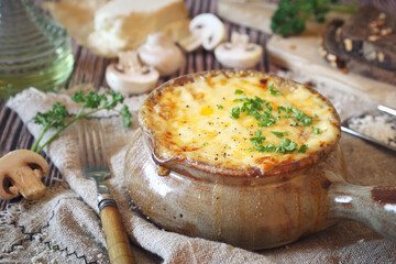 Mushroom julienne baked with cheese