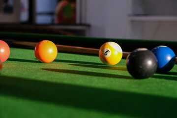 Close-up billiard balls on green table