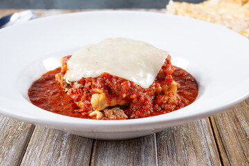 A view of a plate of lasagna.