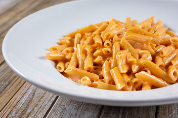 A view of a plate of chipotle penne pasta.
