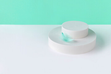 Mock up background with podium for product display and feather