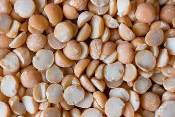 Background of dry pea grains close-up.