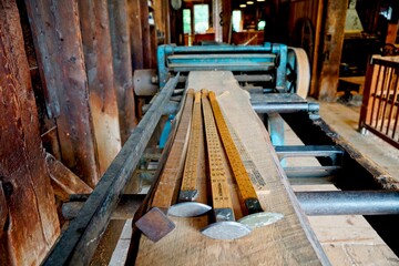 Fototapeta na wymiar Yard sticks to measure lengths of wood in old mill