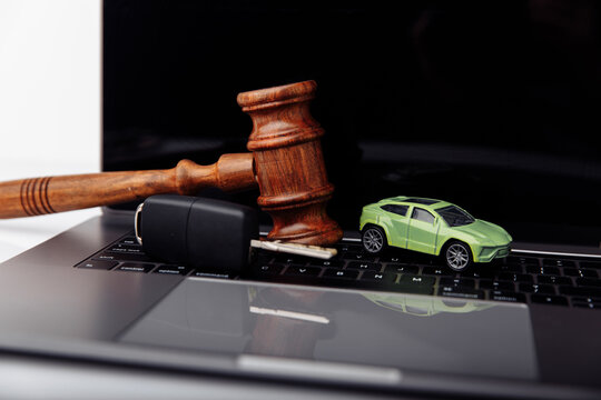 Wooden Judge Gavel With Key And Car. Auction And Bidding Concept