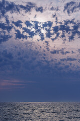 Sky above the sea surface before the rain.