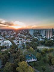 Obraz premium aerial view of a sunset in saavedra park, a typical neighborhood of Buenos Aires, Argentina. 