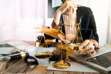 Business and lawyers discussing contract papers with brass scale on desk in office. Law, legal services, advice, justice and law concept picture with film grain effect
