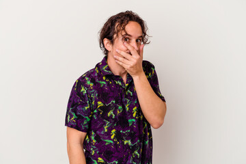 Young caucasian man isolated on white background scared and afraid.