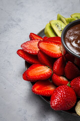 Dish of Fruits with chocolate ready to eat take away