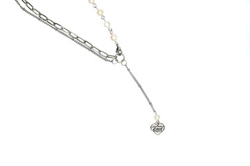 Fototapeta premium Cropped view of stylish chain with pendant isolated on white. Woman trendy fashion accessories. Fashionable jewelry.