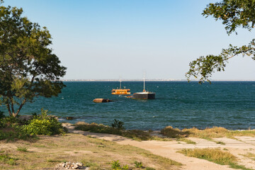 The rusty hull of a long-sunken ship off the coast the Black Sea near the city of Feodosia in the Crimea © garmashevanatali