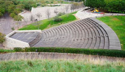 external amphitheater with stone stairways and  garden - obrazy, fototapety, plakaty
