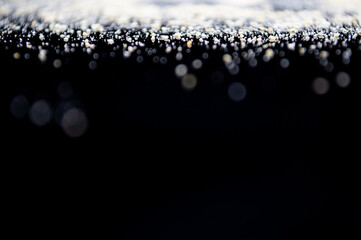 white flour on a black background, texture