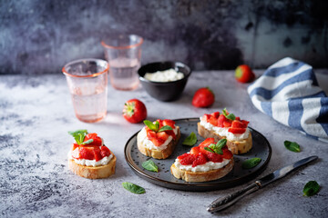 Strawberry ricotta sandwiches with mint leaves