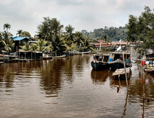 River Fishing Village Scene in Bintulu Sarawak Borneo - 424269176