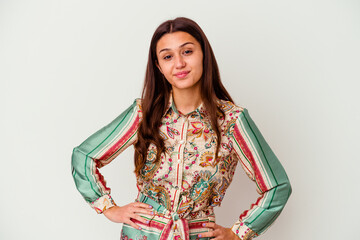 Young Indian woman isolated on white background confident keeping hands on hips.