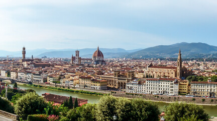 Fototapeta na wymiar Panorama cityscape of Florence on Arno river. Famous Cathedral of Santa Maria del Fiore, Basilicas, churches etc from Michelangelo terrace square point. Sunny summer day view