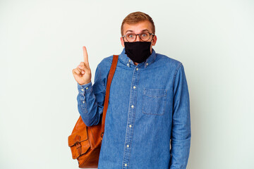 Young student caucasian man studying german isolated on white background