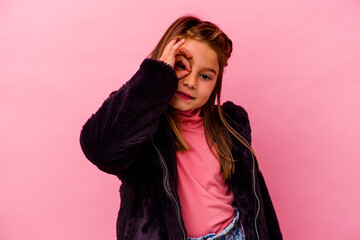 Fototapeta premium Little caucasian girl isolated on pink background