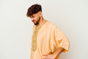 Young Moroccan man isolated on white background suffering a back pain.