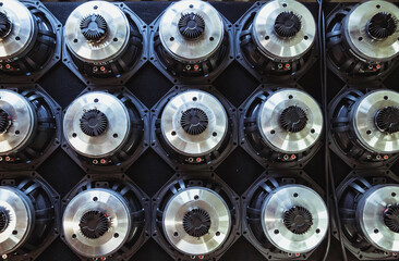 music speakers lie on the table in the workshop