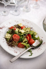 Vegetable salad with cucumber, tomato, cheese, toast, mushrooms, herbs